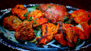 Tandoori Chicken - Cambridge Crossing Restaurant Tandoori chicken at Passage to India in Cambridge MA - Authentic North Indian cuisine