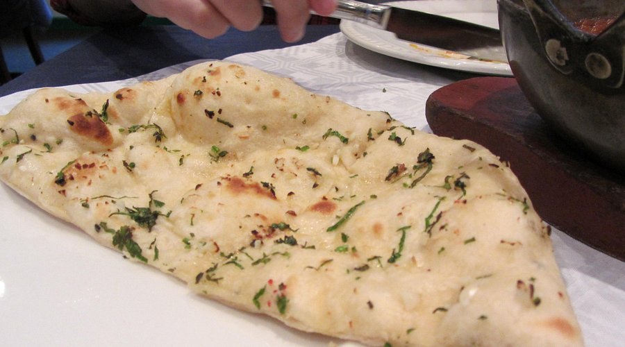 Garlic Naan - Indian Restaurant Cambridge Fresh garlic naan bread at Passage to India Cambridge restaurant - Authentic Indian bread Cambridge MA